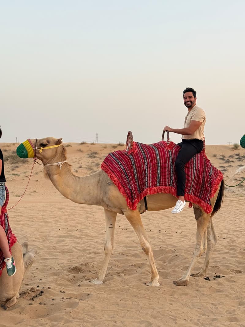 Brookz on a camel ride in the desert